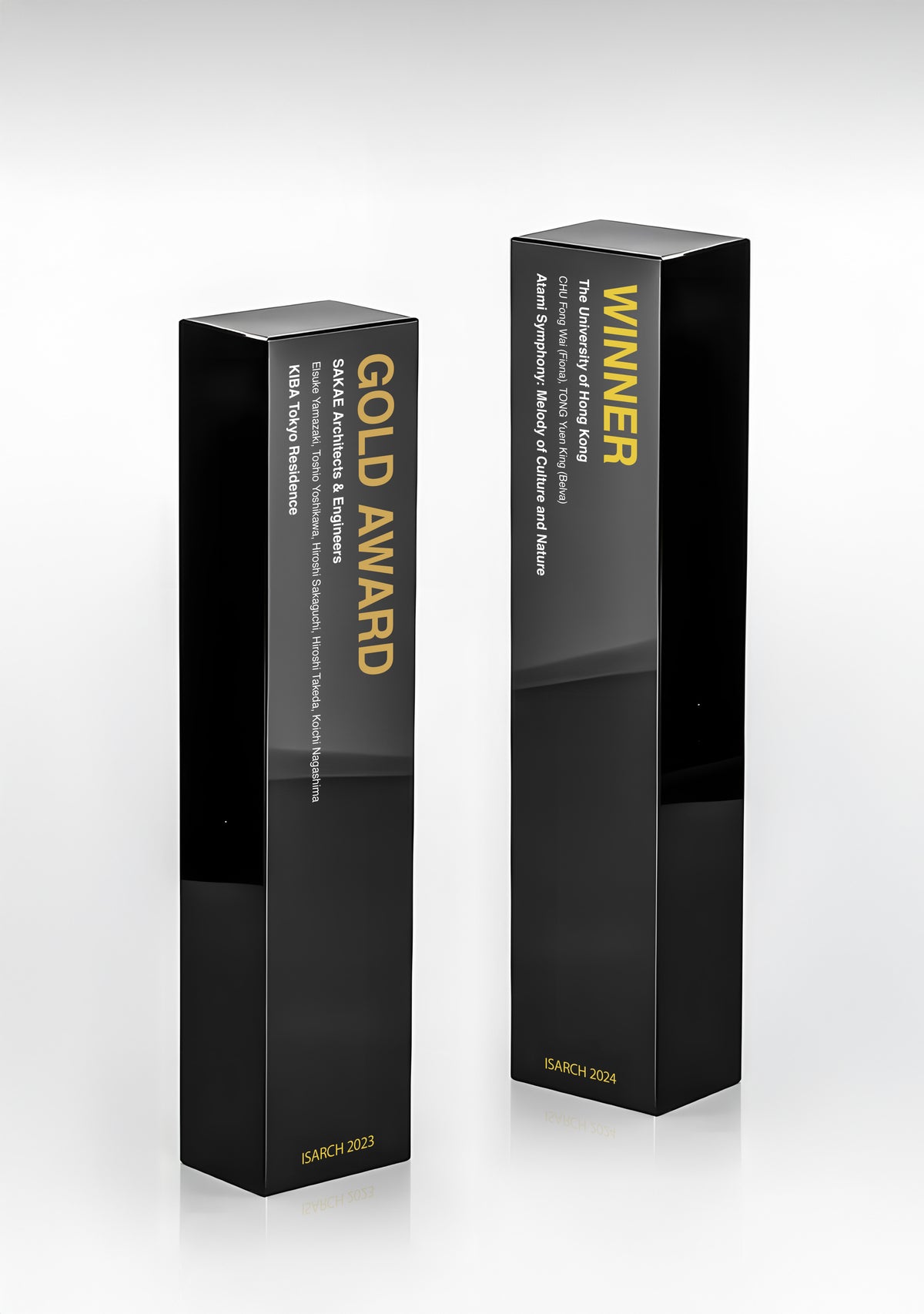 Two ISARCH trophies on a white ground: black crystal columns with the prize printed in gold.